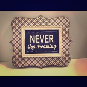 Never Stop Dreaming sign
